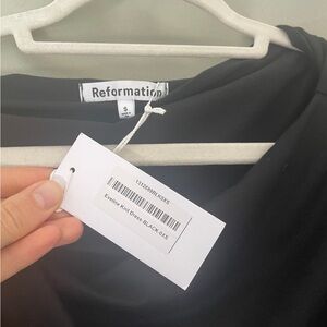 Reformation black stretchy off the shoulder mini dress